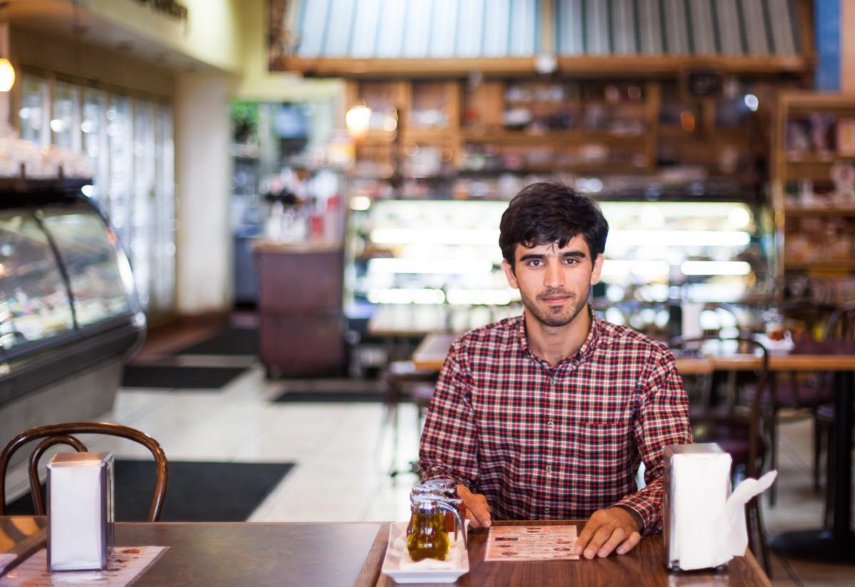 While working as an interpreter for the United States in Afghanistan, Ajmal Massoumy received threats from the Taliban and was forced to flee. While working as an interpreter for the United States in Afghanistan, Ajmal Massoumy received threats from the Taliban and was forced to flee.