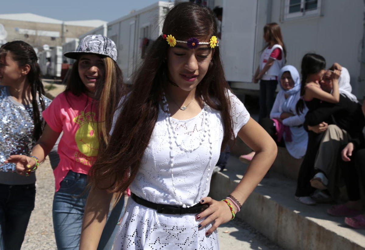 Nazia and Rolian met at the Eleonas refugee camp near Athens, Greece, and bonded over a love of dance. Nazia and Rolian dance at the Eleonas refugee camp near Athens, Greece