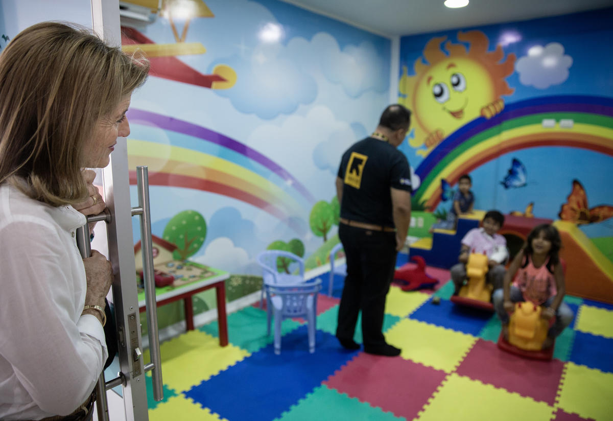 Caroline Kennedy visits a playroom for refugee children