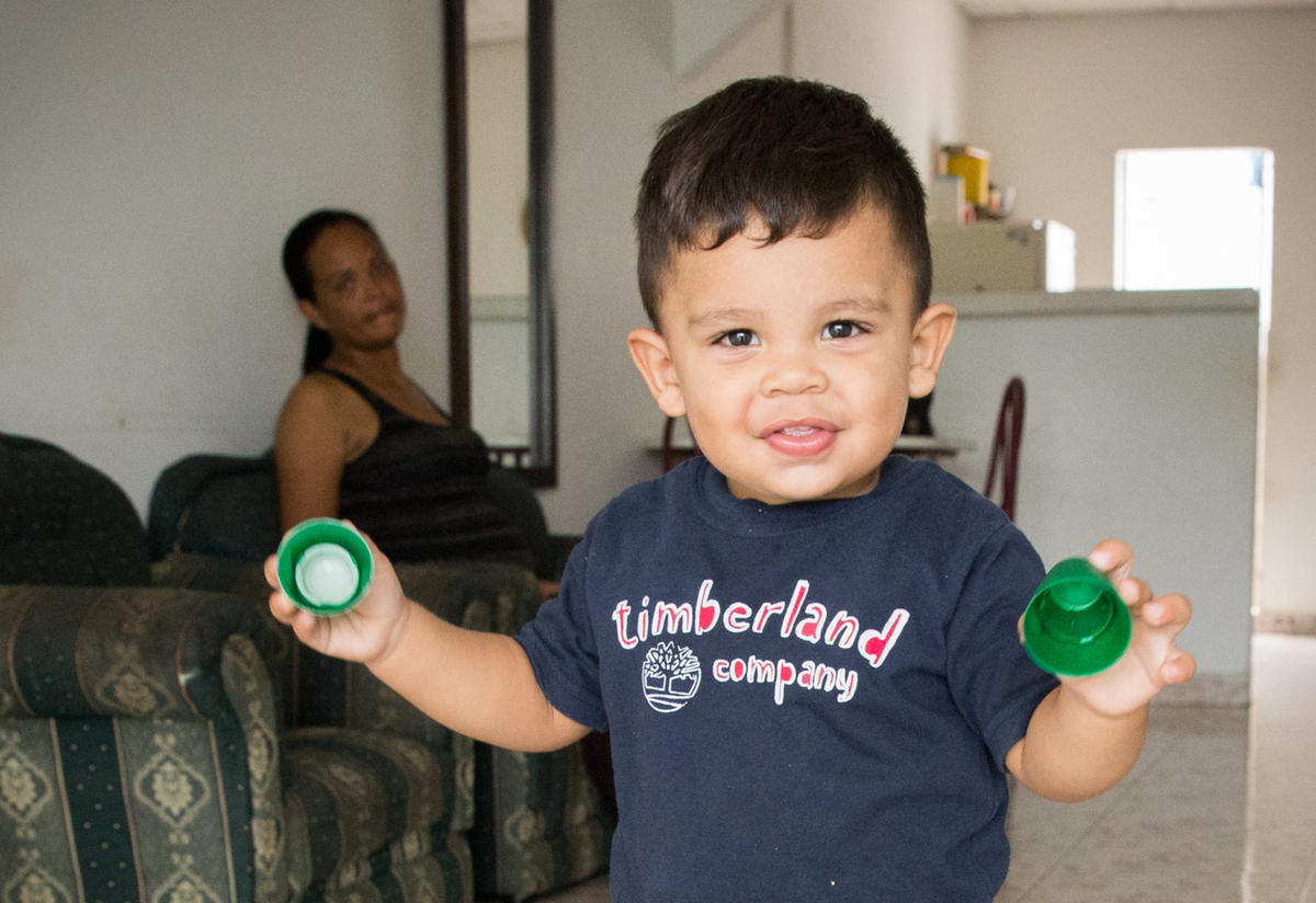 Matías with his mother Cibel at home