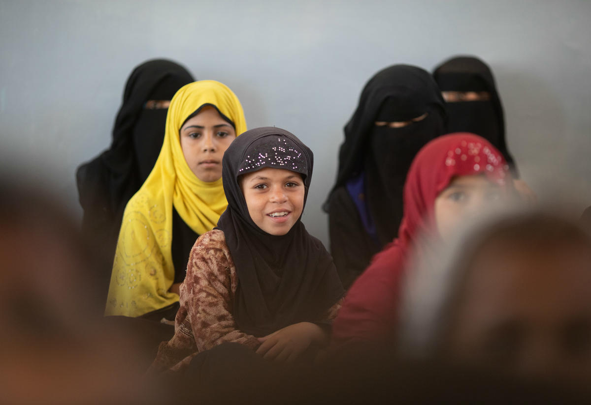 Girls sit in class at their local school in the isolated village of Al Rukbah, Adhale Governorate, Yemen 