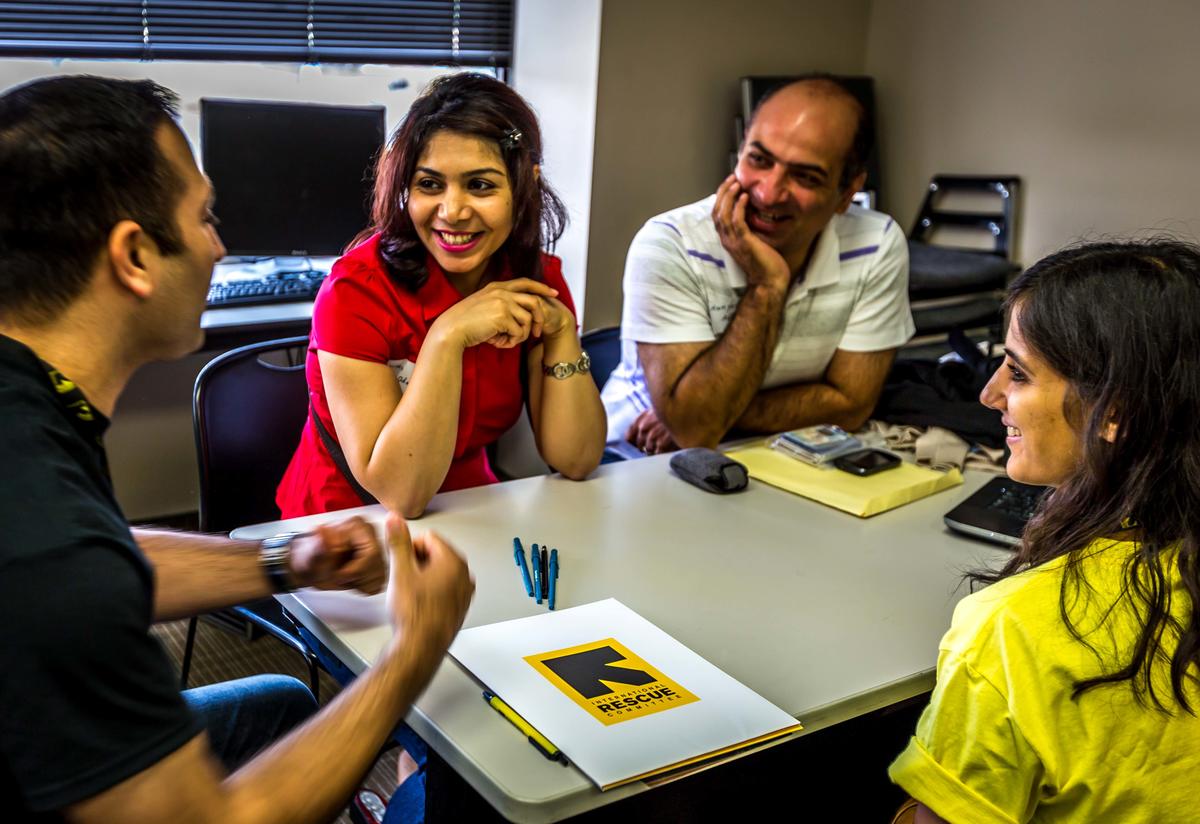 IRC staff help clients prepare resumes in Economic Empowerment.