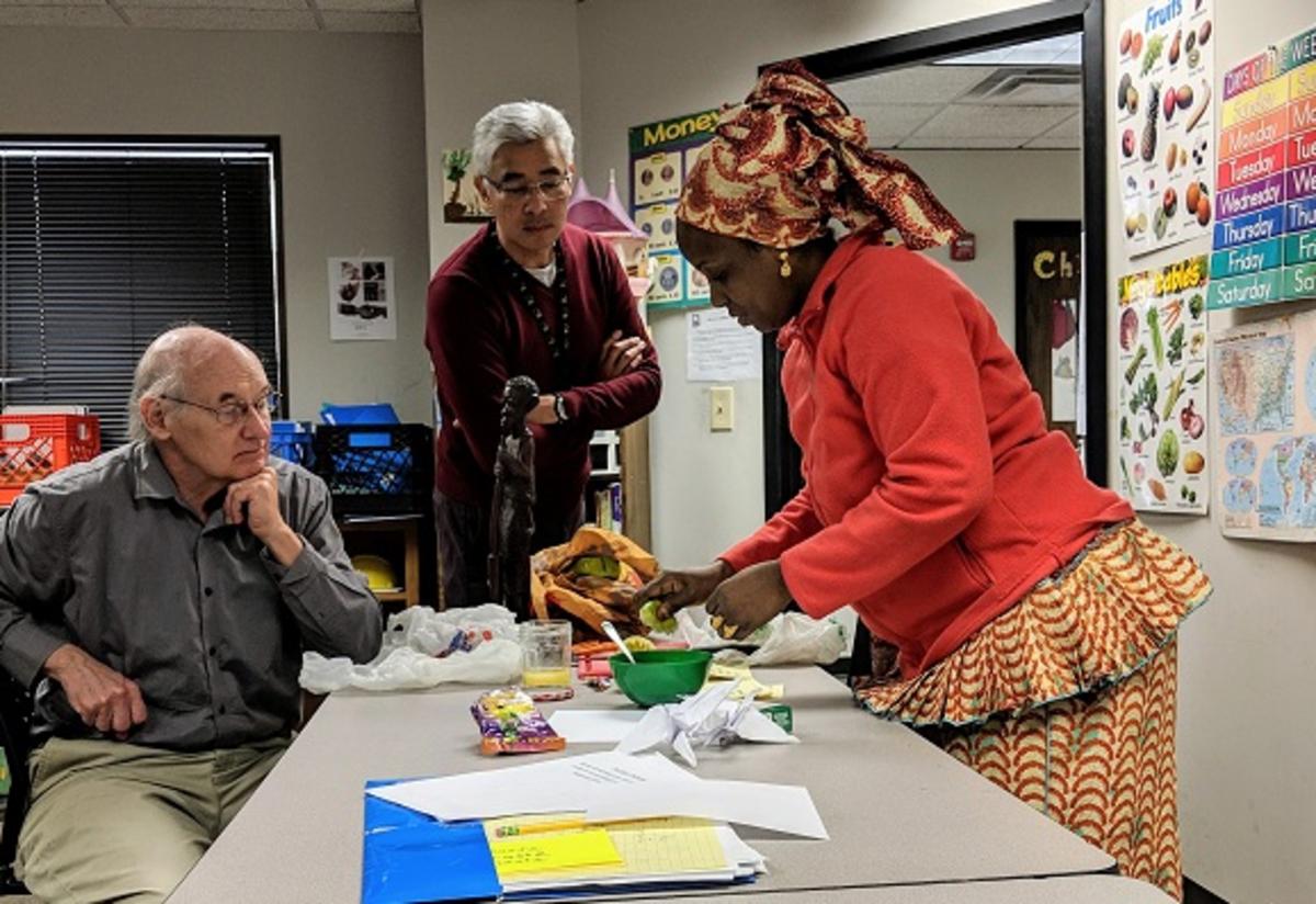 Student Fatoumata makes henna nail paste for her demonstration.