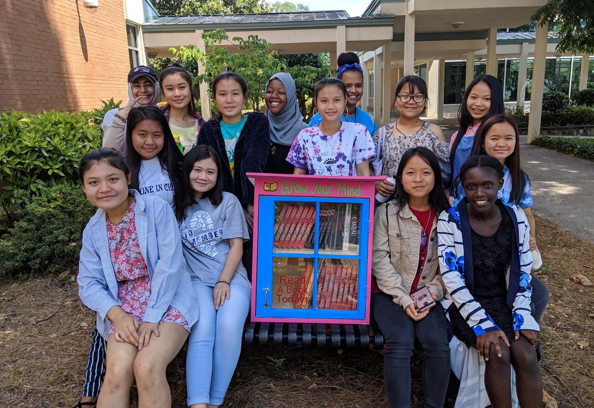 Ready, Set, College! summer camp students with their finished Little Free Library! 