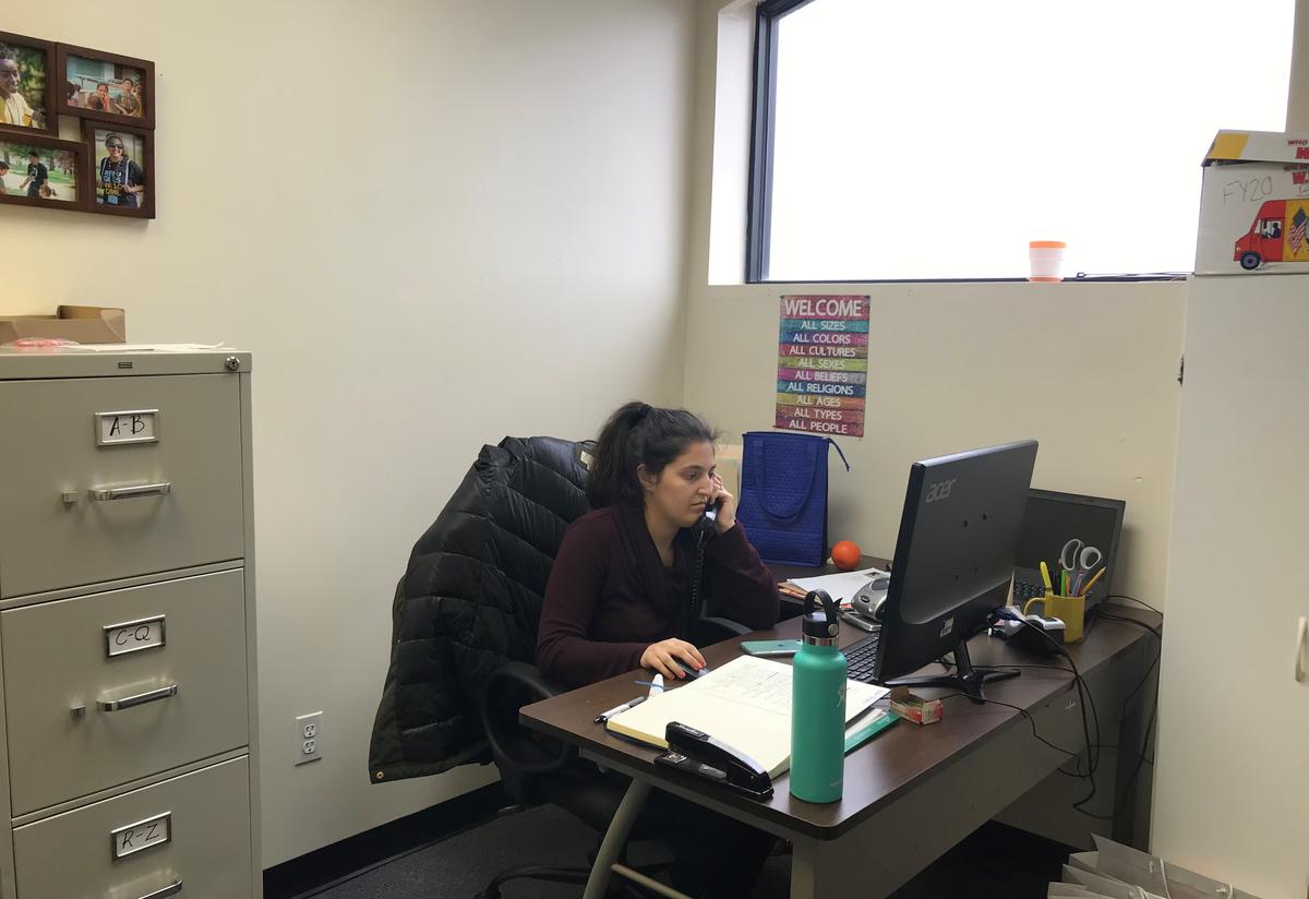 Heather in her office Heather making calls in her office, to support clients