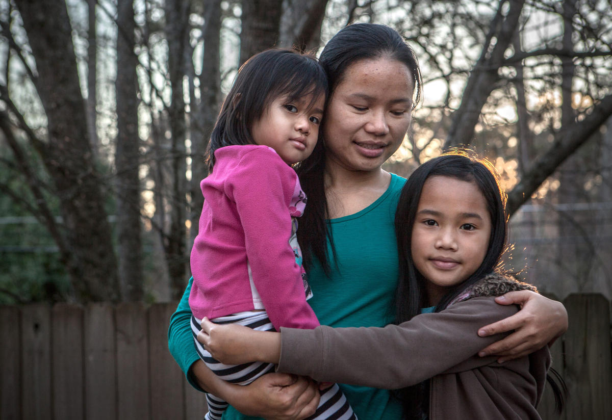 Klaw Htoo with her daughters Gloria and Sophia at their new home in Atlanta