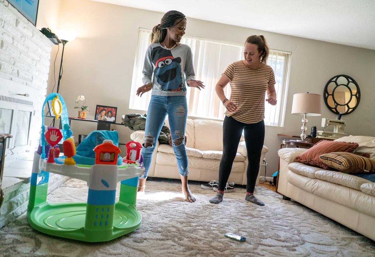 Refugee Youth Dancing Two Refugee Youth Dance in Living Room Boise