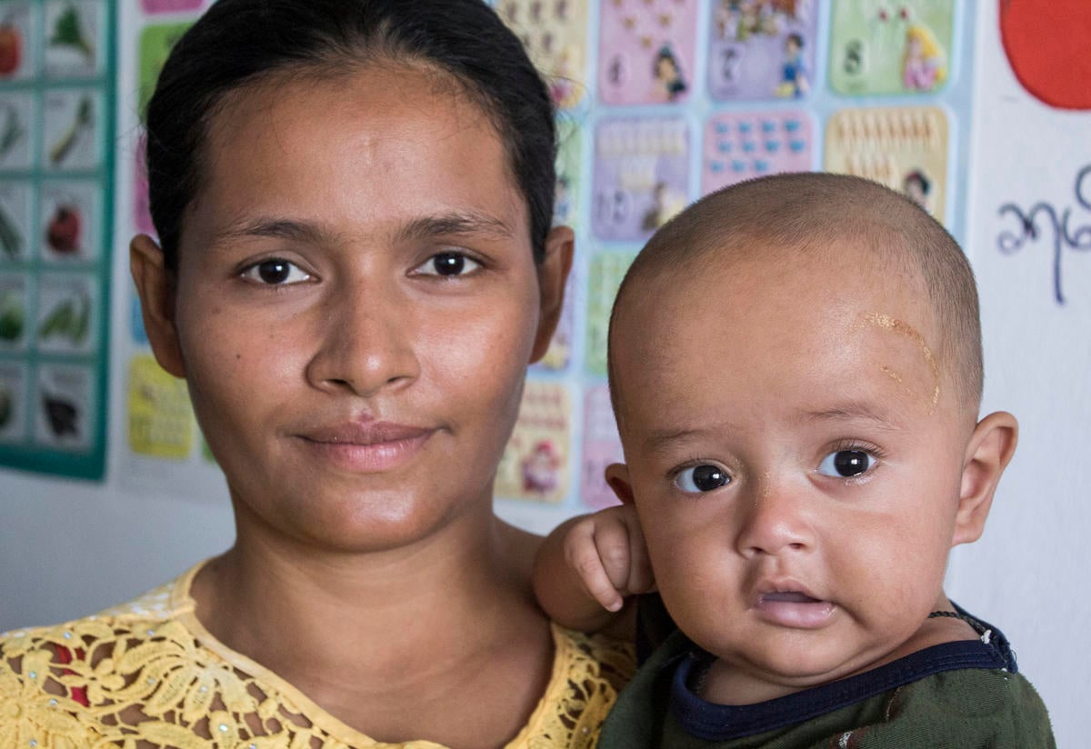 A mother with her child at a health clinic