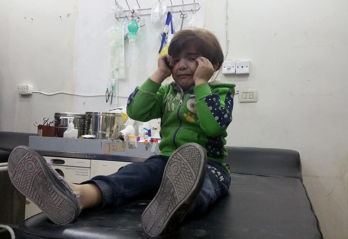 A Syrian child receives treatment at a hospital after chemical attack A Syrian child receives treatment at a hospital after chemical attack