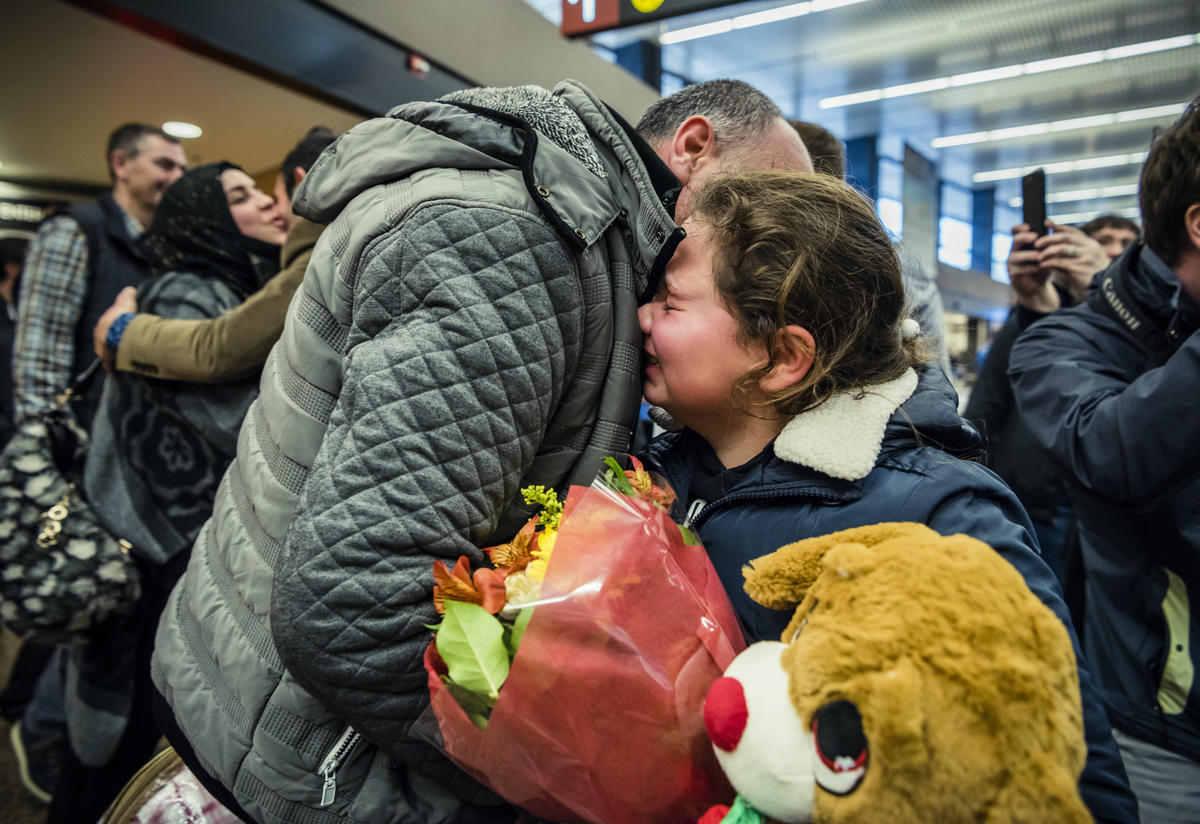 The Bazara family embrace at Sea-Tac airport Syrian father and daughter embrace at a Seattle airport as their family is reunited