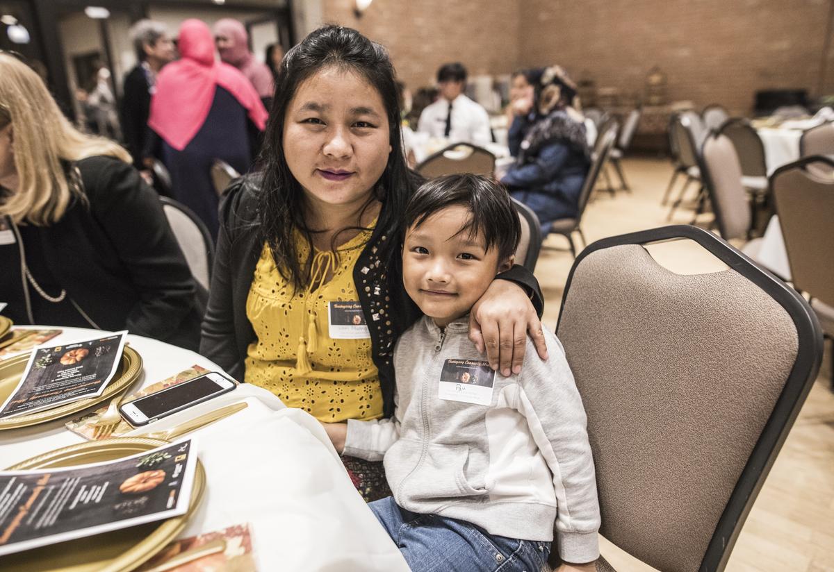 A mother and son at the table