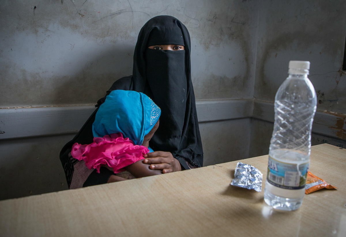 A woman and child at an IRC health clinic in Yemen A woman and child at an IRC health clinic in Yemen
