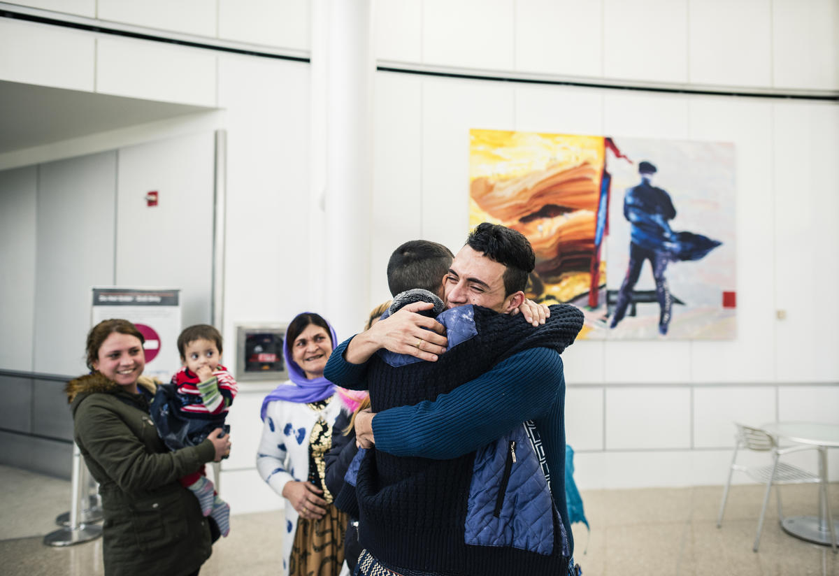 Adil Kheder Nimr, a Yazidi refugee, was reunited with his family on February 10. in Tukwila, Washington after they were banned from entering the U.S. 