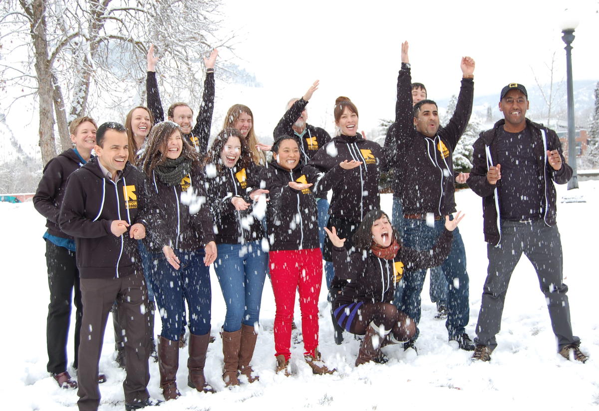 Winter Celebration Group throws snow in the air.