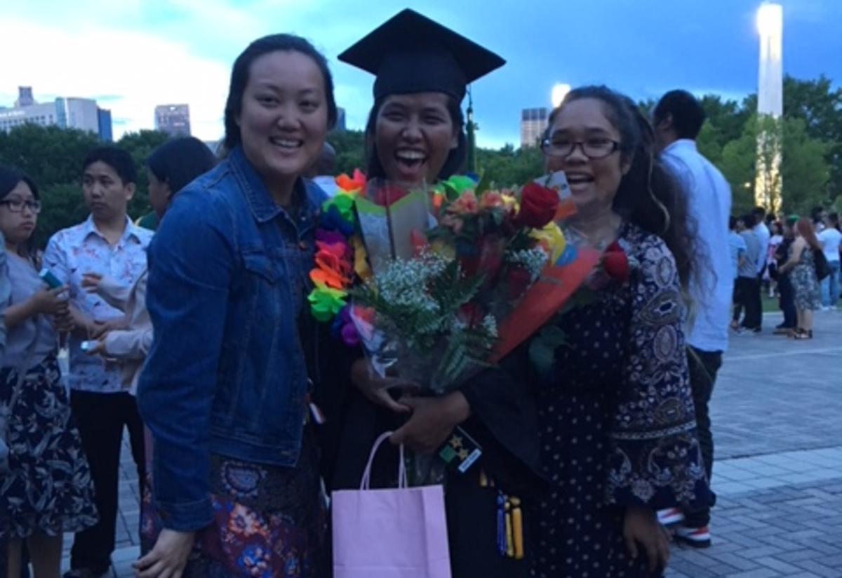 San at her Clarkston High School Graduation with Ms. Sharita and Ms. Daisy. 