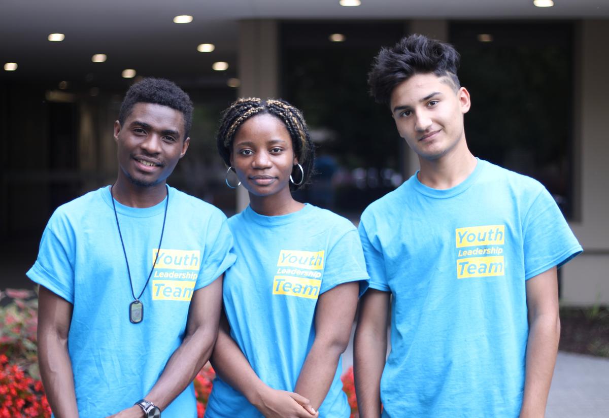 Dedieu, Moza and Edris outside the new Oakhurst Medical Center at Northlake. 