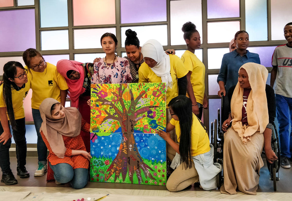 Students created a collaborative art piece representing their roots and their dreams. Students created a collaborative art piece representing their roots and their dreams.