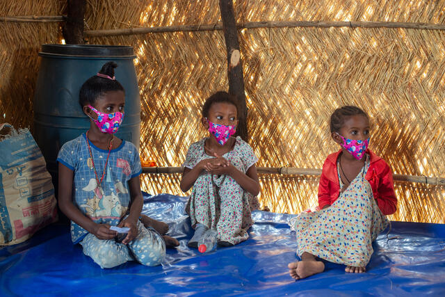 Children sitting at IRC safe space in Sudan