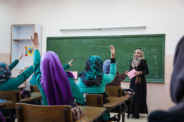 Women's Protection and Empowerment clients participate in an education session as part of the Hands Up for Syria project in Jordan.