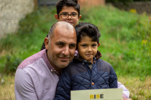 IRC RISE client Khaled with his two sons. 