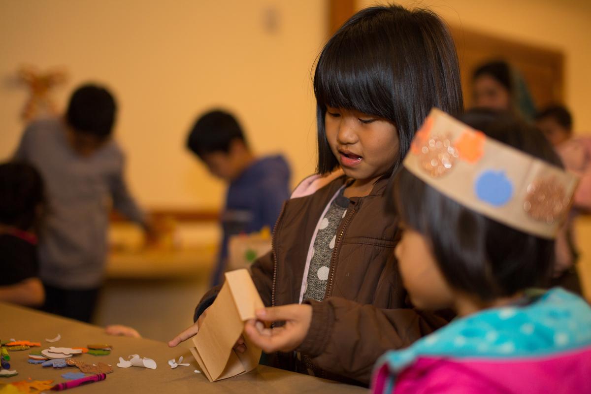 The IRC in Salt Lake City's Breaking Bread featured activities for all The IRC in Salt Lake City's Breaking Bread featured activities for all, including kids activities--featured, two refugee children making festive fall crowns.