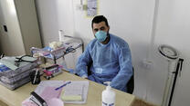 Dr. Hazem at the IRC's clinic. Our health clinics in Jordan, including in Azraq and Za'atari refugee camps, remain open in spite of a national lockdown.