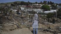 Rahima stands in Moria camp following the fires
