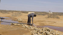 Man with water pipeline