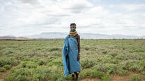 Lokiyoto Ekal, 30 poses for a portrait near her home in RukRuk village in Turkana, Kenya