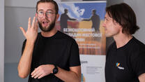 Deaf interpreters Oleksii and Roman