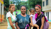 A Colombian family poses for a photo.