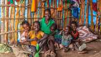  A portrait of Makito with five of her nine children. Makito supports her nine children and husband who suffers from depression. Through the EU-funded IRC cash assistance program, Makito received four rounds of cash assistance totaling 8900 Ethiopian Birrs—approximately 150 Euros.