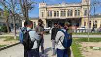 IRC staff provide information to young people at Trieste Central Station.