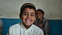 Child smiling at the camera