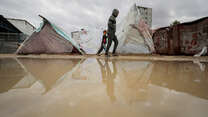 A reflection of Palestinians living in makeshift tents, struggling with harsh weather conditions amid Israeli attacks in Deir al-Balah, Gaza.