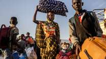 Sudanese refugees flee to South Sudan with little more than they can carry.