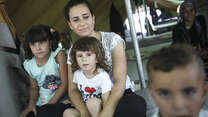 Syrian family in Alexandria refugee camp in Greece.