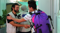 Domenico Di Nuzzo, Senior Safe Zone Officer bids farewell to an unaccompanied child leaving for Germany to be reunited with his uncle.