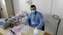 Dr. Hazem at the IRC's clinic. Our health clinics in Jordan, including in Azraq and Za'atari refugee camps, remain open in spite of a national lockdown. 