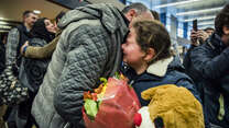 A Syrian family is reunited in a Seattle airport after the travel ban was challenged