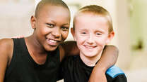 Jeff Balubwila, 11, with his friend, Caden Nash, 9. 