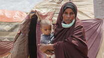 Amina with her son.