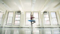 Ballerina Christine dancing in a studio.