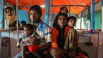 A Rohingya family with their children at an IRC-supported health center in Cox's Bazar, Bangladesh