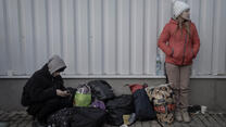 Ukrainian refugees gather at Przemysl railway station. 