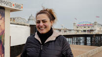 Chadia smiles on Brighton beach
