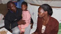 Andrew with his wife and daughter