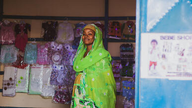 A woman in Cameroon poses for a photo.