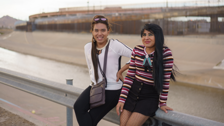 Gianna and Fernanda pose at the US-Mexico border