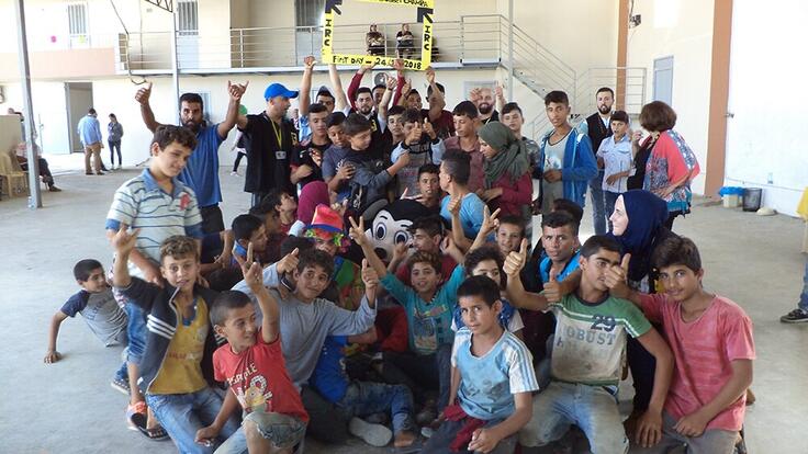 A group of young men gather for a photograph after receiving child protection support from the IRC in Tripoli. This would include sessions focused on understanding their legal rights, vocational skills training and personalised one to one sessions with a case worker.